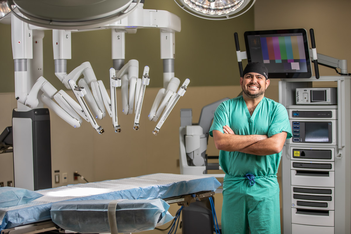 Surgeon with robotic arm equipment